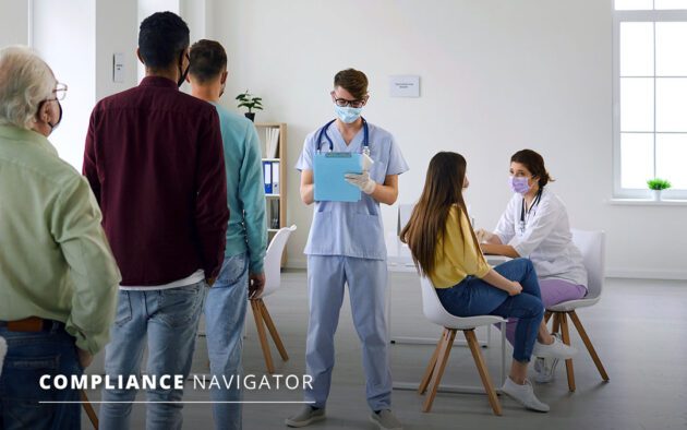 Line of people waiting to speak to a doctor. One doctor is holding a clipboard at the front of the line and the other is sitting at a table