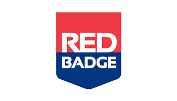 Red Badge logo featuring a shield design with a red top and blue bottom, and the words "RED BADGE" in white capital letters.